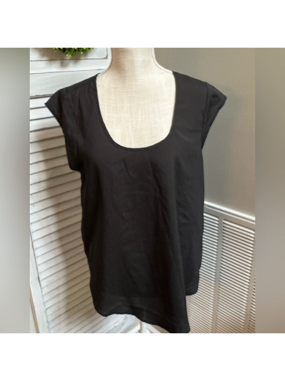 Women’s  Daniel Rainn Black sheer sleeveless top.  Size M.